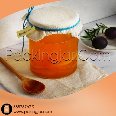 عسل طلایی در جار شیشه ‌ای: هدیه‌ ای خالص از آغوش طبیعت